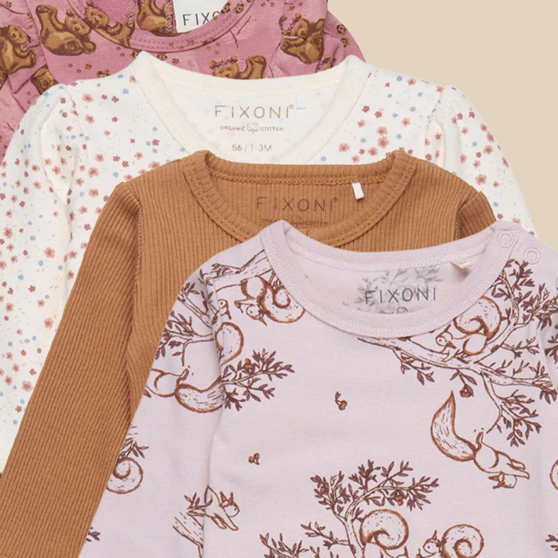 Fire babygensere i ulike mønstre og farger fra merket Fixoni.