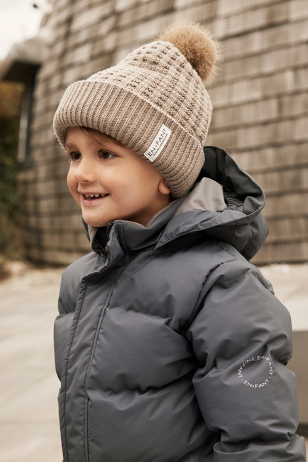 EN FANT Lue Ullblanding med Fuskepels, Fungi